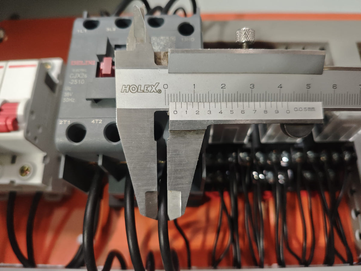 Electrical wiring inspection inside a 7.5kW three-phase inspection lift control box