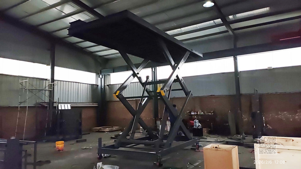 Industrial scissor lift hydraulic system detail — dual-layer scissor structure